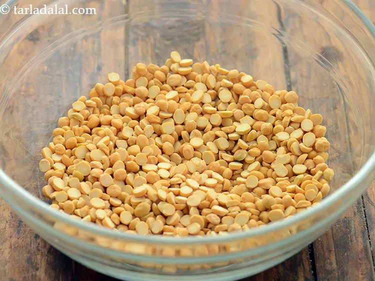 Step 2 – To make the <strong>Maharashtrian style puran poli</strong> mixture take 1 cup chana dal in a …