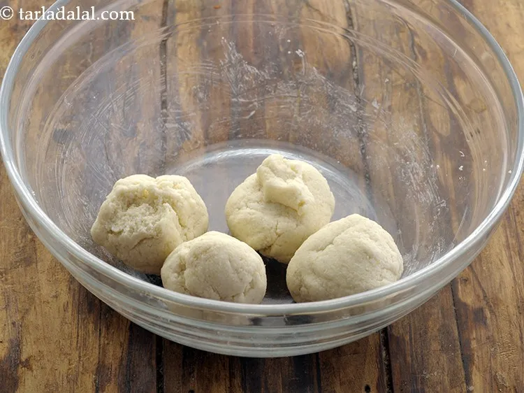 Step 39 – To prepare homemade puri for <strong>puchka</strong>, knead the dough again and divide the dough into …