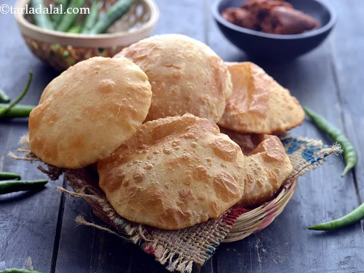 Step 15 – Serve the <strong>poori</strong> hot. You can enjoy the <strong>poori</strong> with&nbsp;<a href="https://www.tarladalal.com/Sukhi-Aloo-Bhaji-Dry-Potato-Sabzi-41885r" target="_blank">Sukhi Aloo Bhaji</a>, <a …