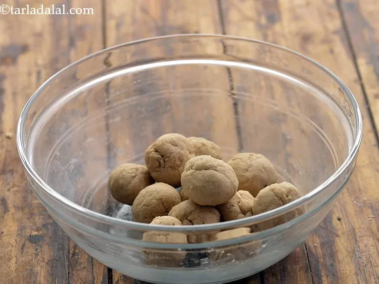 Step 27 – To roll the <strong>puri</strong> for frying, after 15 minutes, divide the dough into 12 equal …