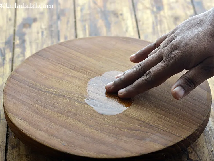 Step 12 – Apply little oil on the rolling board.