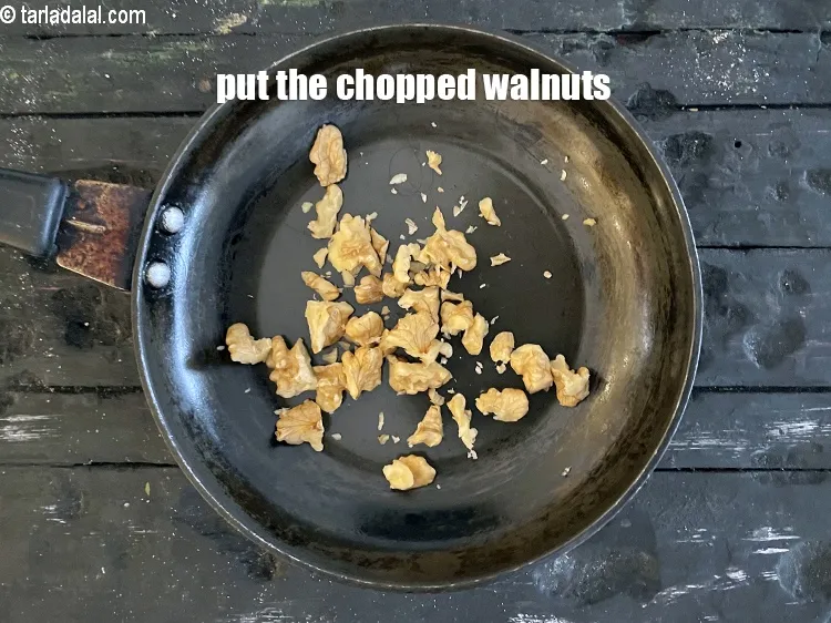 Step 7 – Put the chopped walnuts.