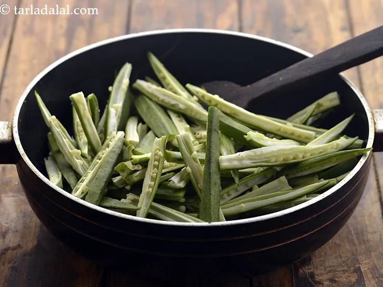 Step 10 – Add the bhindi.