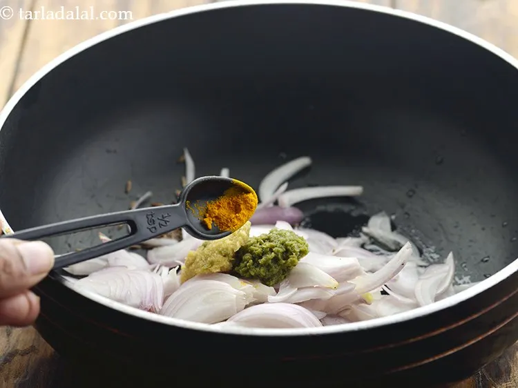 Step 8 – Add turmeric powder.