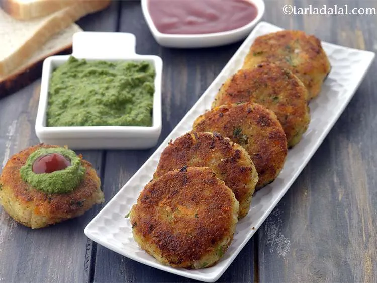 Step 18 – Serve the <strong>crunchy vegetable bread cutlets</strong> immediately with green chutney and tomato ketchup. Shallow-fried <strong>bread …