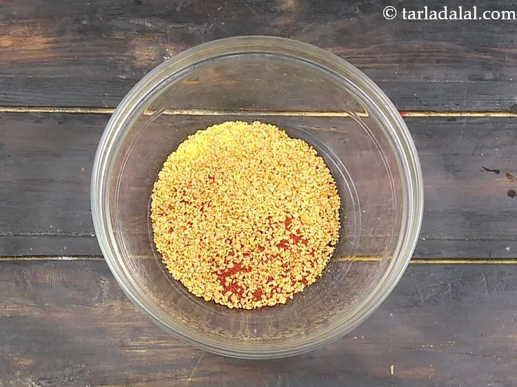 Step 6 – Add split fenugreek seeds. These are called as methi kuria and commonly used in pickles.