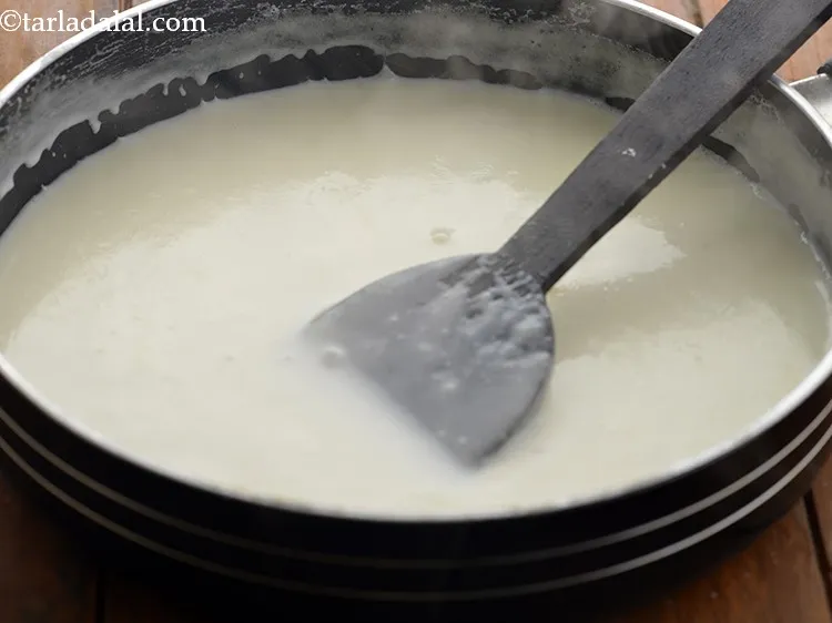 Step 11 – Mix well and cook on a medium flame for 3-4 minutes, while the <strong>Cheese Fondue …