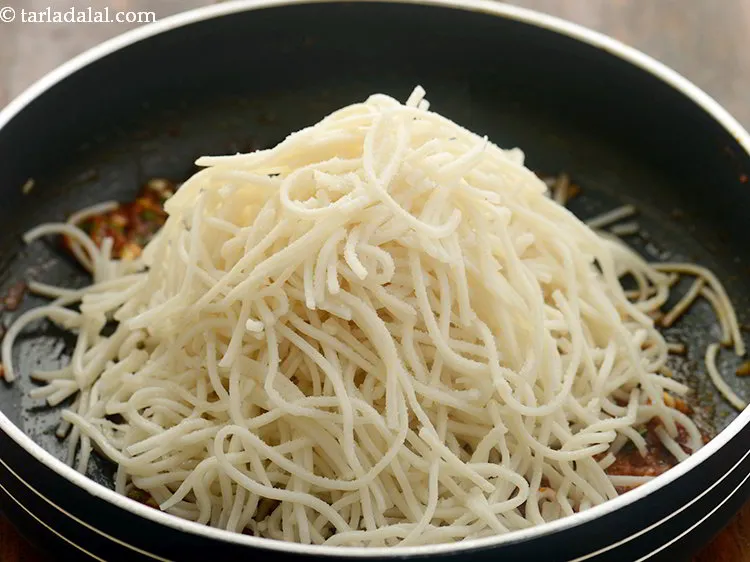 Step 12 – Add the boiled noodles and salt.