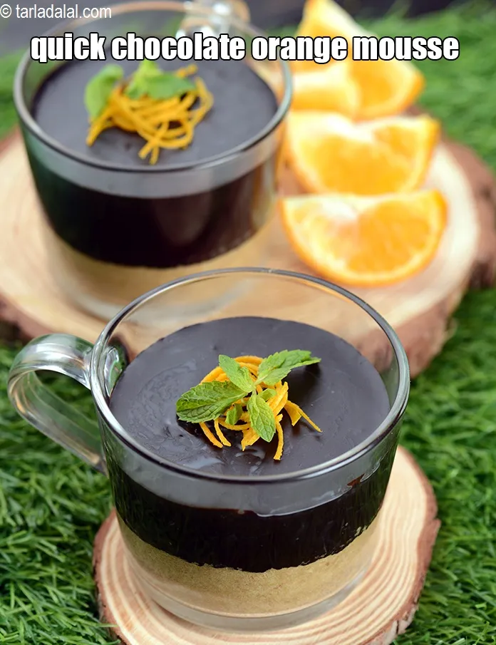 Step 19 – Serve<strong> chocolate orange mousse</strong> chilled garnished with orange rind and mint leaves.&nbsp;