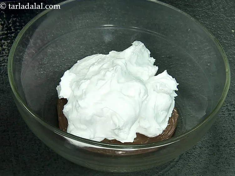 Step 3 – Add beaten whipped cream.
