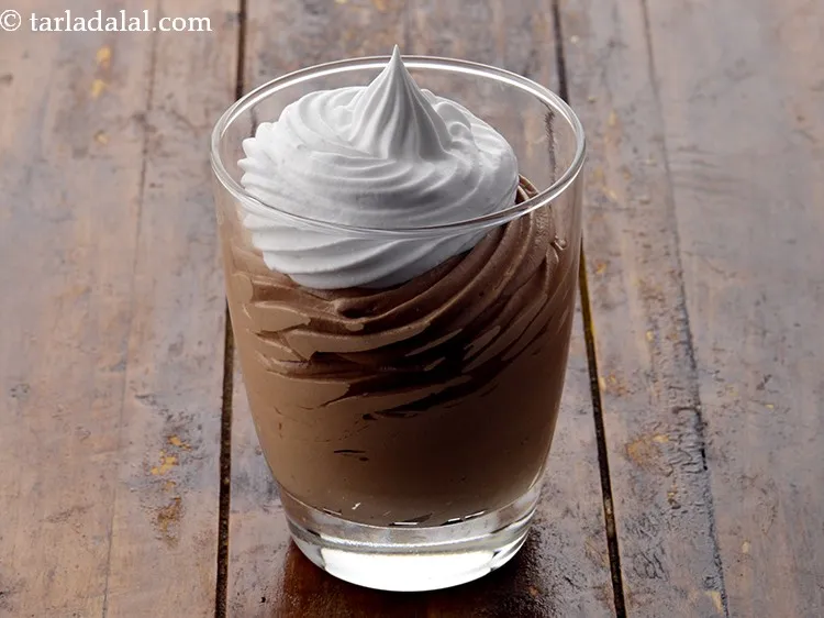 Step 6 – To garnish Nutella mousse glass, put the beaten whipped cream into a piping bag with …
