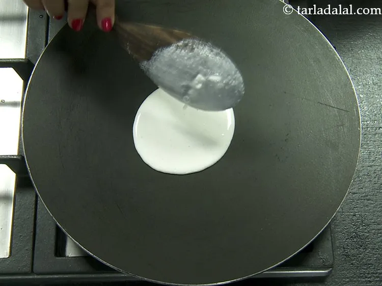 Step 15 – Pour a ladleful of batter on it.