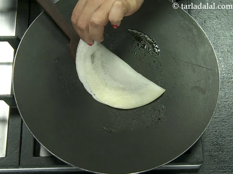 Step 18 – Take care to see that the dosa does not become crisp as this is a …