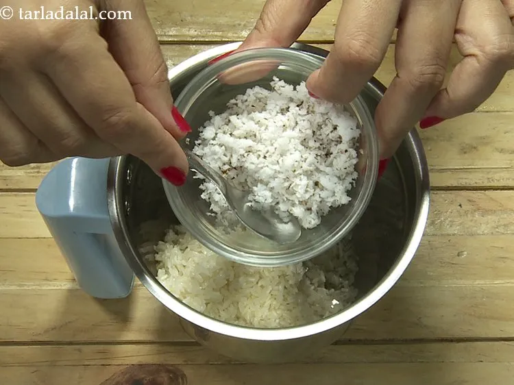Step 7 – Add grated coconut.