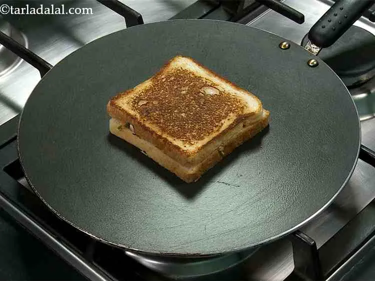 Step 15 – Place the sandwich on it with the buttered side facing upwards and cook on a …