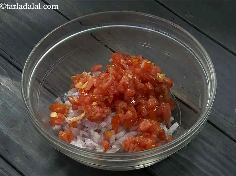 Step 2 – Now add finely chopped tomatoes.