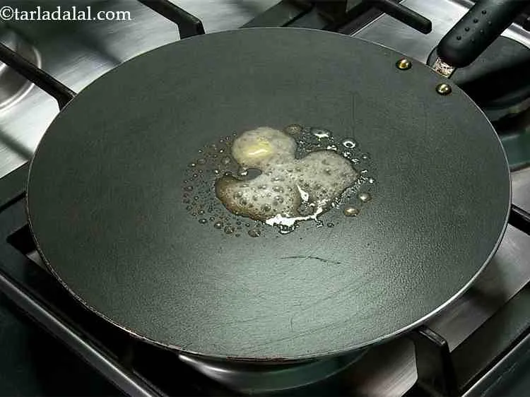 Step 14 – Heat a non-stick a tava (griddle), put ? tsp of butter for cooking. You can …