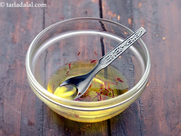 Step 4 – Mix well and let the saffron soak in water while we make <strong>shrikhand</strong>. Keep aside. …