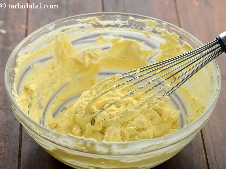 Step 15 – Mix well using a whisk and our <strong>homemade shrikhand</strong> is ready. Do not whisk vigorously …