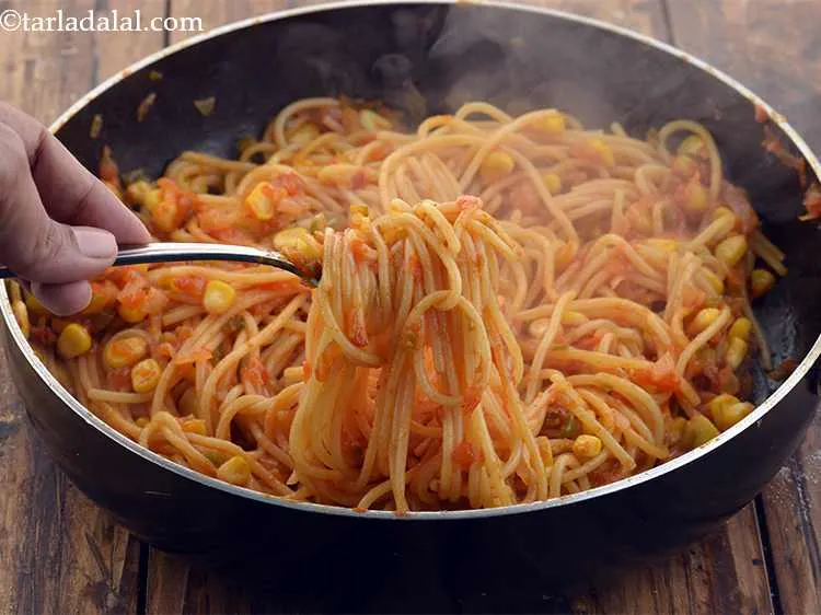 Step 26 – Cook &nbsp;<strong>quick Indian style spaghetti&nbsp;</strong>on a medium flame for 3 to 4 minutes, while stirring …