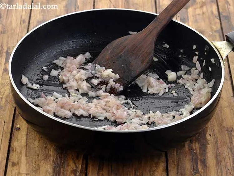 Step 11 – Saut&eacute; the onions on a medium flame for 2 minutes. They should be soft and …