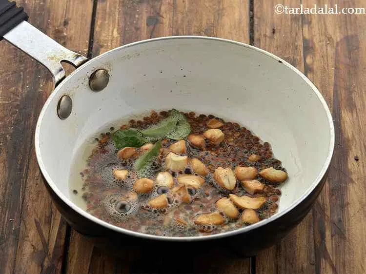 Step 12 – Add the curry leaves.