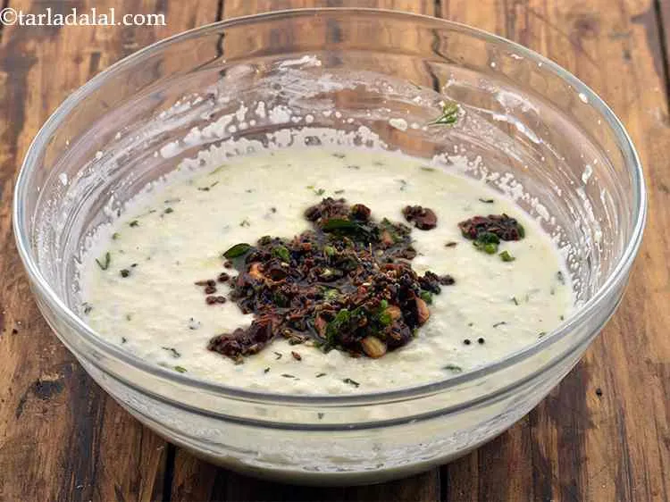 Step 15 – Add this tempering to the batter. You can even add vegetables to this batter and …