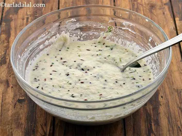 Step 16 – Mix well and our instant rava idli batter is ready. The batter should neither be …