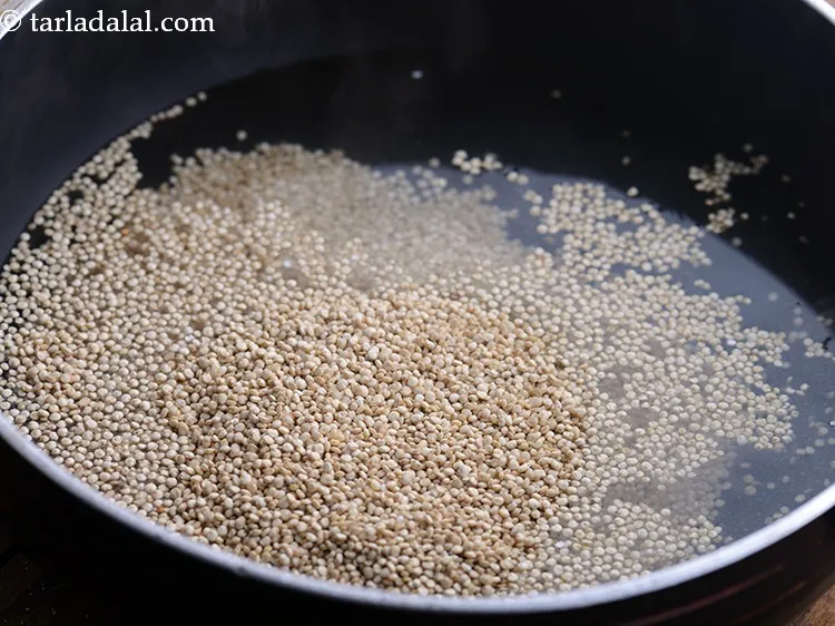 Step 7 – Add the washed quinoa to it to make <strong>healthy brown rice quinoa vegetable salad</strong>.
