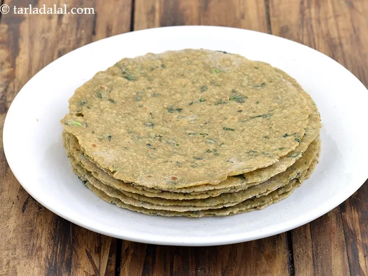 Step 22 – Repeat steps 2 to 4 to half cook and brush the remaining rotis.