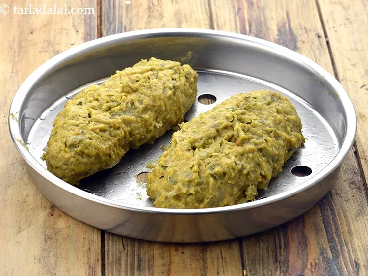 Step 20 – Arrange 2 rolls on a greased sieve.