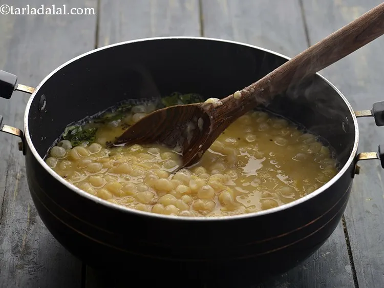 Step 15 – Add the cooked peas.