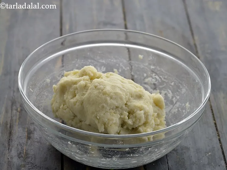 Step 27 – Mix well till the mixture is soft, lump-free dough. Keep aside.