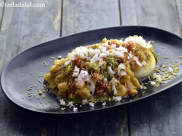 Step 52 – Top with 2 tbsp of finely chopped onions for the crunch.