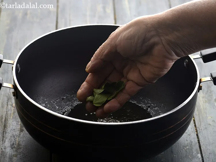 Step 12 – Add the curry leaves.
