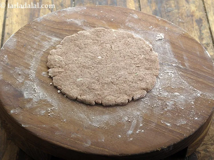 Step 26 – It requires a bit of knack to roll nachni dough. Not to worry, once you …