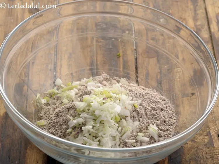 Step 3 – Add finely chopped spring onions whites. You can even make use of regular onions if …
