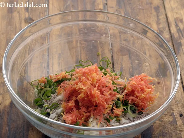 Step 5 – Add grated carrot. You can even add any leafy greens of your choice like fenugreek, …