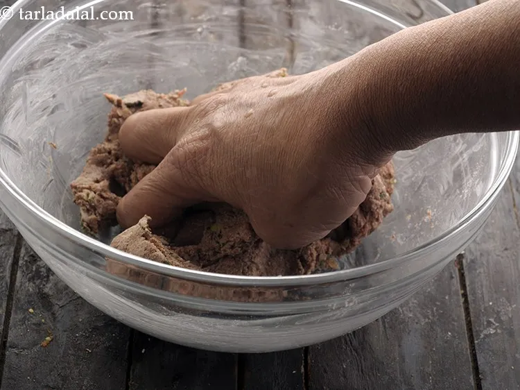 Step 9 – Combine all the ingredients to form the nachni roti dough.