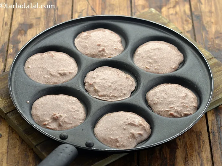 Step 22 – Pour a spoonful of the batter into each of the 7 moulds one by one. …