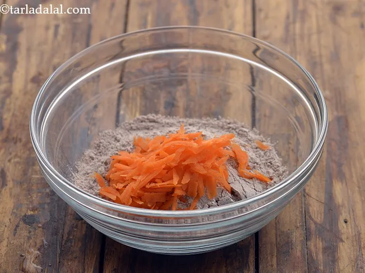 Step 13 – Add grated carrot to it. These will add a good dose of vitamin A.&nbsp;