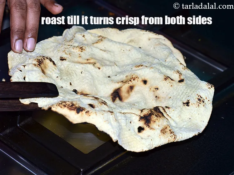 Step 18 – If you wish, you can also use fried Bikaneri papad instead of roasted papad.&nbsp;