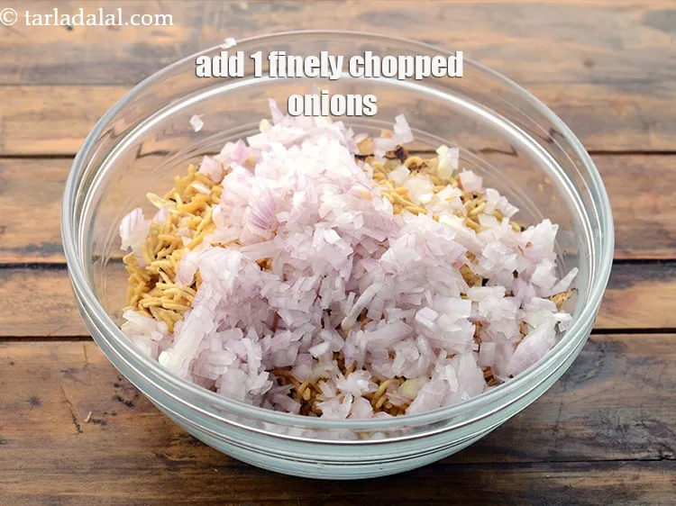 Step 9 – Add 1/2 cup&nbsp;finely&nbsp;<a href="https://www.tarladalal.com/glossary-chopped-onions-722i">chopped onions</a>. This is a must to give contrast in texture and …