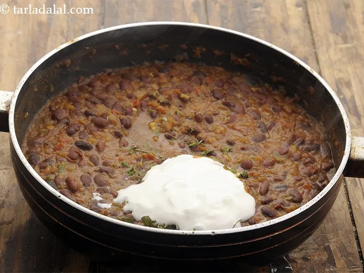 Step 30 – <p>Add fresh cream, which would make our rajma creamy and even tastier.</p>