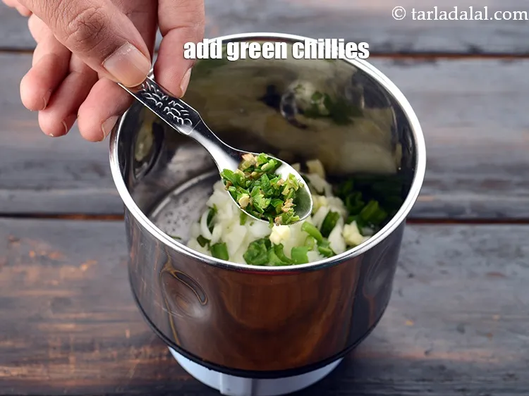 Step 12 – Add 1/4 tsp&nbsp;<a href="https://www.tarladalal.com/glossary-chopped-green-chilli-820i">chopped green chillies</a>. This gives the required spice.&nbsp;