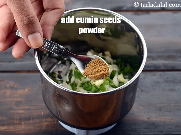 Step 13 – Add a pinch&nbsp;<a href="https://www.tarladalal.com/glossary-cumin-seeds-powder-jeera-powder-zeera-powder-382i">cumin seeds (jeera) powder</a>.