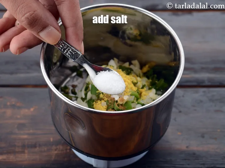 Step 16 – Add&nbsp;<a href="https://www.tarladalal.com/glossary-salt-namak-table-salt-418i">salt</a>&nbsp;to taste.<br /> &nbsp;