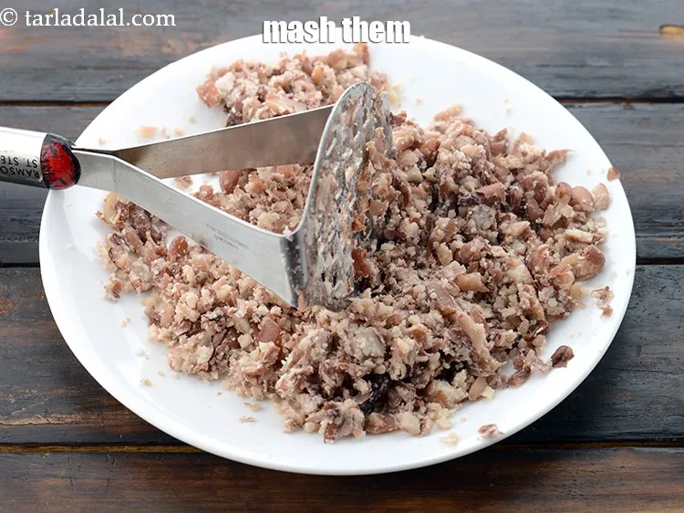 Step 23 – Mash them using a potato masher. Keep aside.&nbsp;