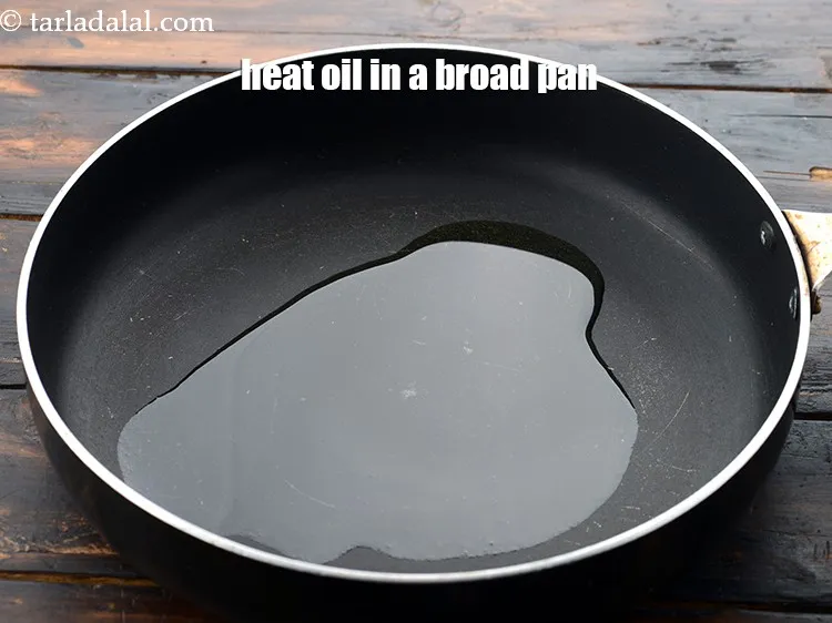 Step 24 – Heat 1 1/2 tsp&nbsp;<a href="https://www.tarladalal.com/glossary-oil-671i">oil</a>&nbsp;in a broad non-stick pan.&nbsp;