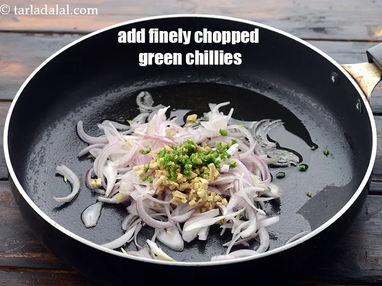 Step 27 – Add 1 1/2 tsp&nbsp;finely&nbsp;<a href="https://www.tarladalal.com/glossary-chopped-green-chilli-820i">chopped green chillies</a>.&nbsp;